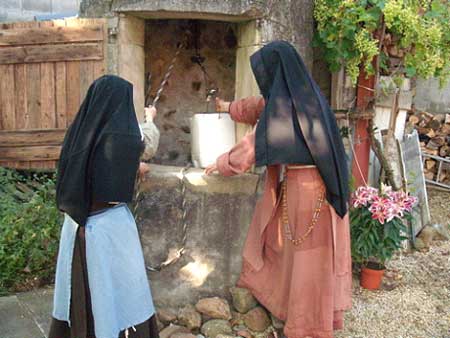 The Poor Clares draw water at the well