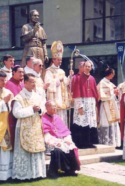 Bishop Lazo assisting at the ordinations in Ecône