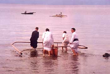 priests going for a boat ride after the retreat
