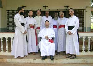 Bishop Fellay with priests in Asia