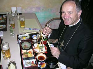 Bishop Fellay eating Japanese food