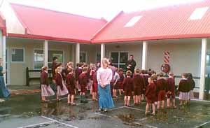 primary students lined up outside